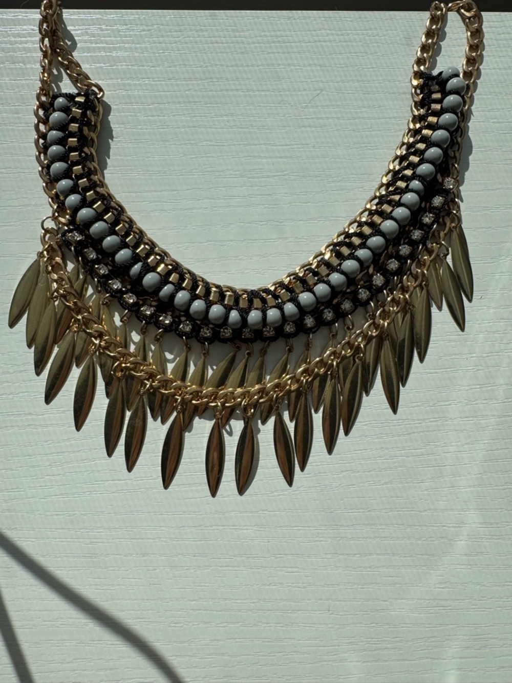 Gold Statement Fringe Necklace with Gray Beads